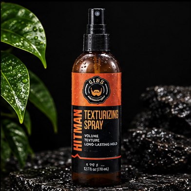 GIBS Hitman Texturizing Spray 5.75 oz on Groom Standard dark stone background