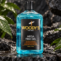 Woody's Mega Firm Gel 12 fl oz on wet stone with green leaves